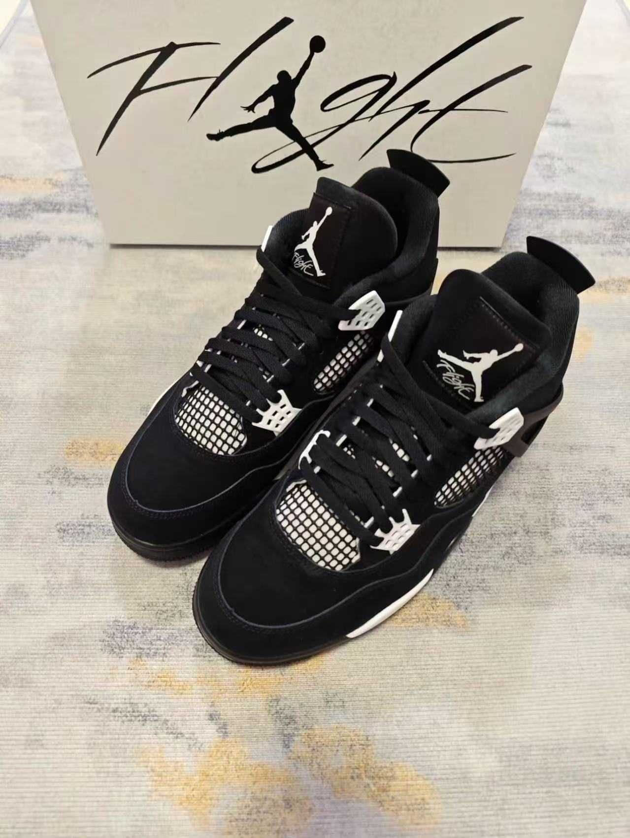 Buty JordanAirJordan4Retro White Thunder sportowe rozmiar. 45