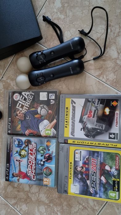 PS3 with controller and 2 Move controllers64309602213251122