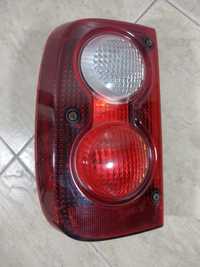 Land Rover Freelander lift 04-06 lampa lewa tył kompletna OLX wysyłka