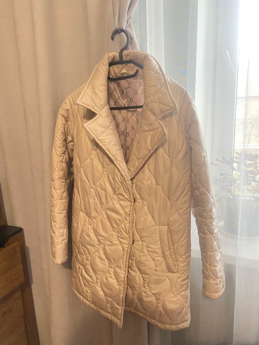 Жіноча стьобана куртка/ пальто з поясом