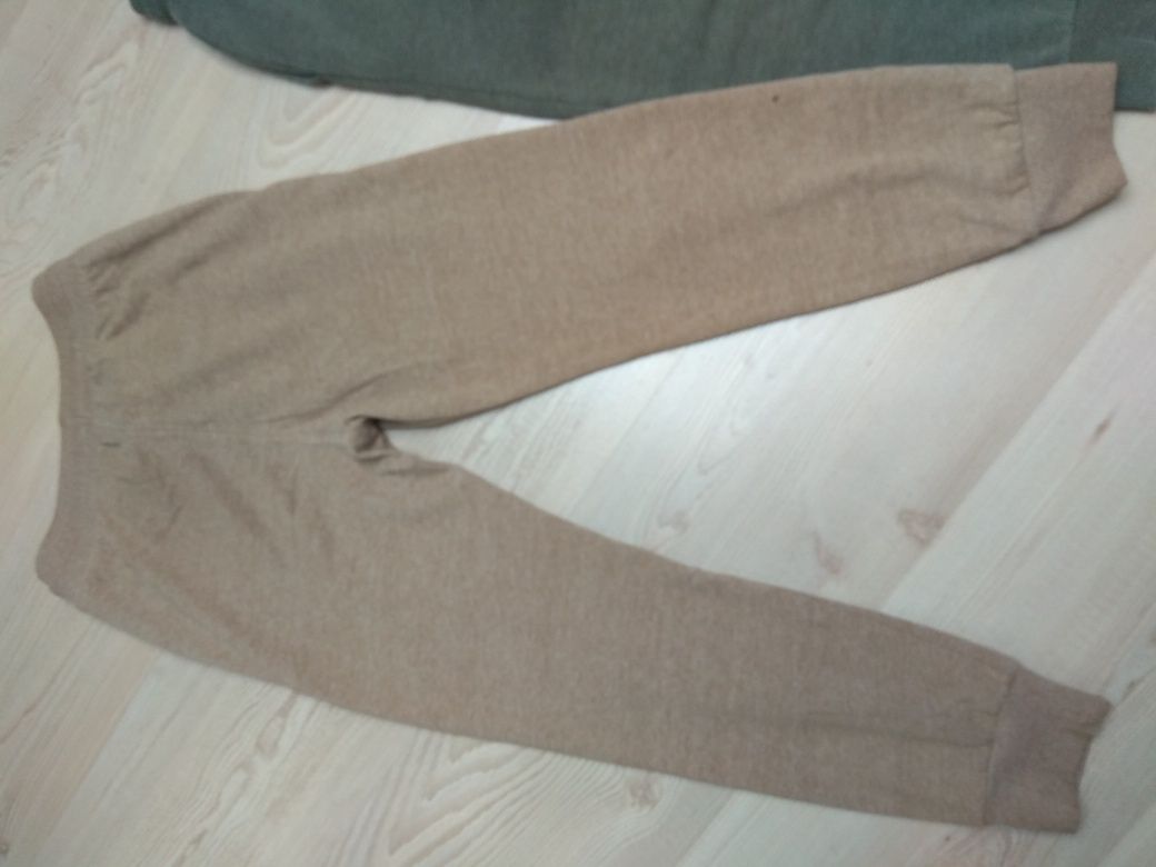 Dwie pary spodni dresowych H&M 128