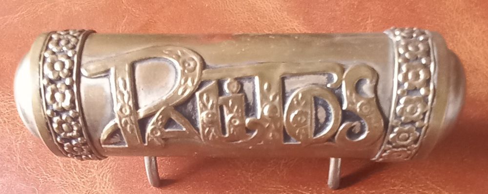 Paliteiro em latão.