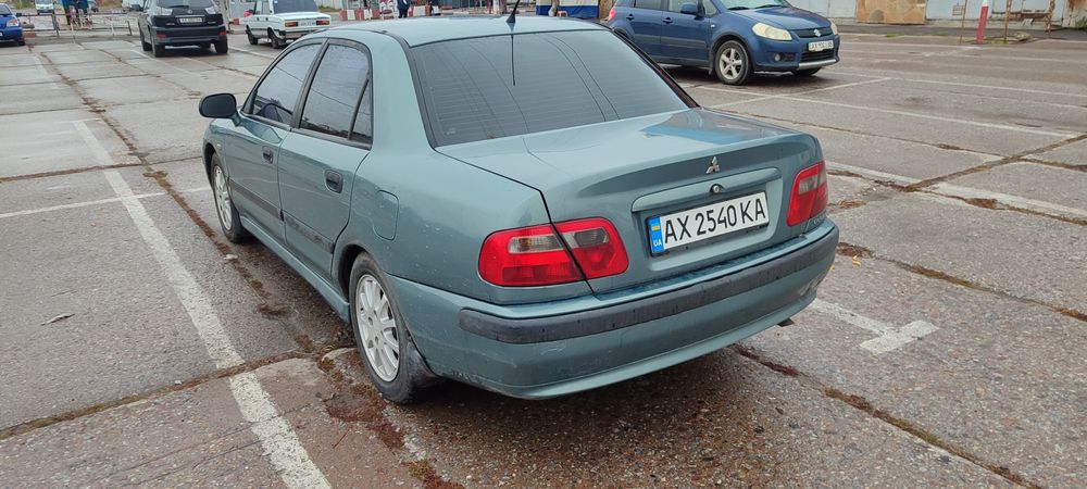 Мицубиси Каризма 2003г  1.6 газ/бенз