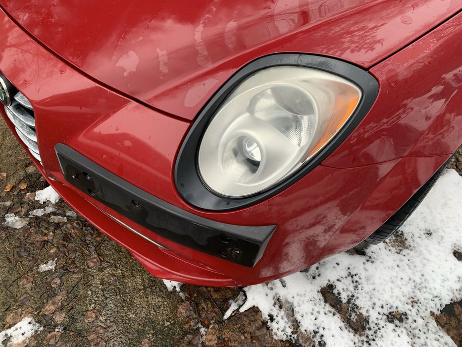 Ramka reflektora lewa Alfa Romeo Mito