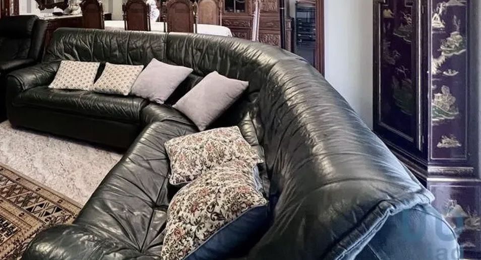 Sofá de canto verde garrafa