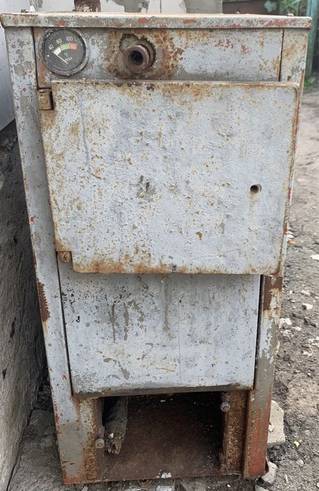 Котел газовий, твердопаливний