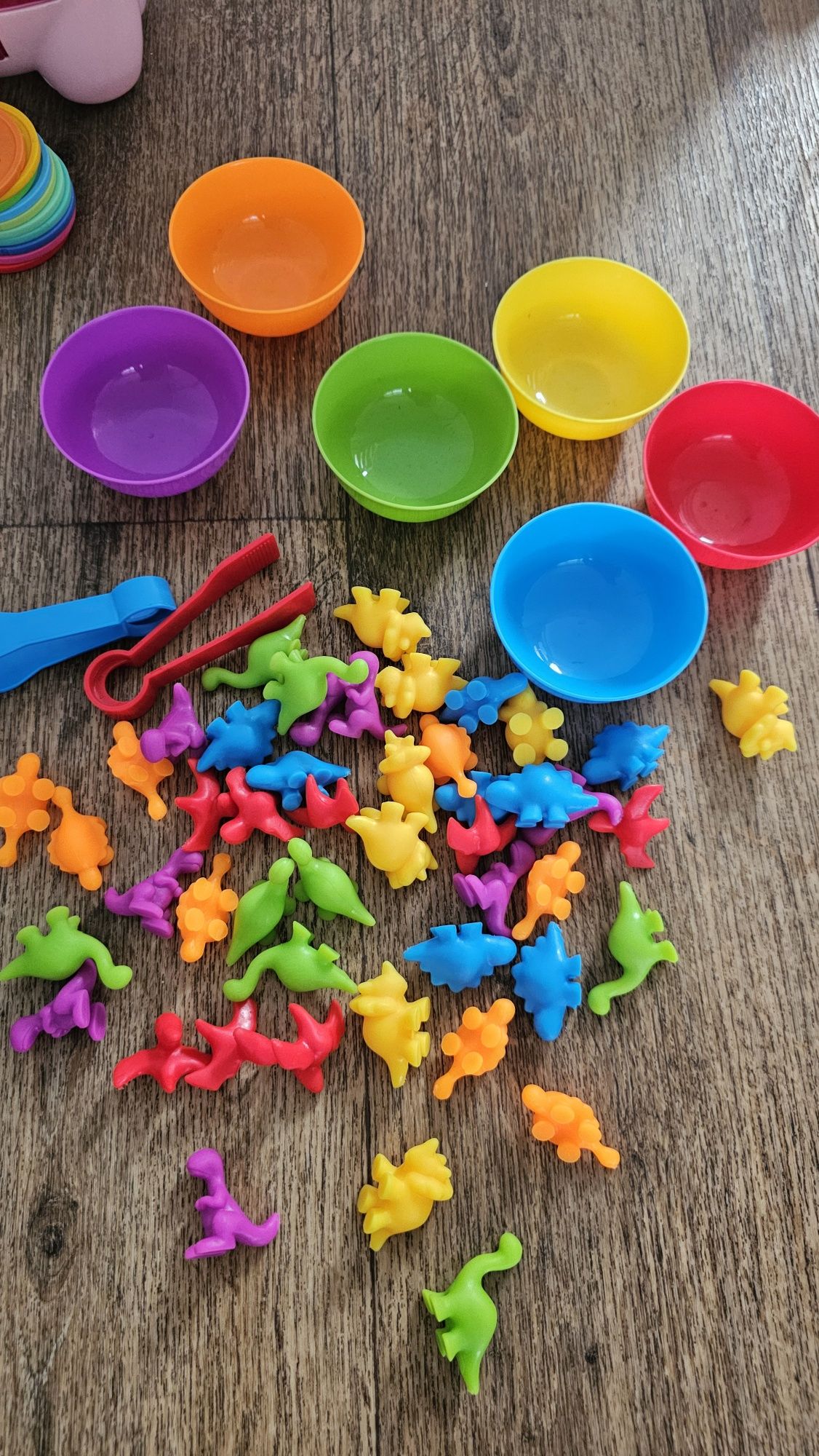 Zestaw zabawek, świnka skarbonka fisher price sorter dinozaury klocki