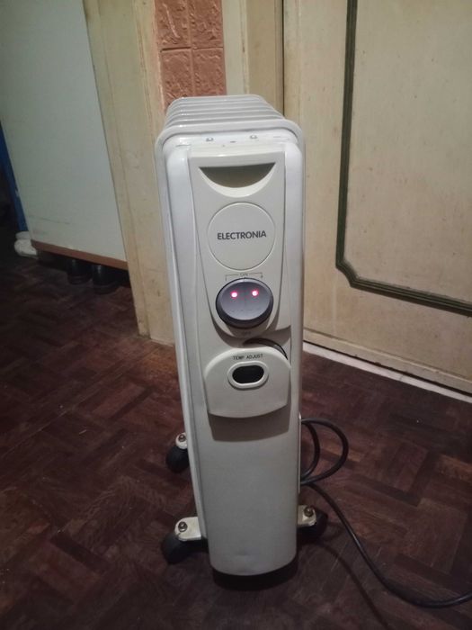 vendo aquecedor a óleo marca electronial 2000w a funcionar