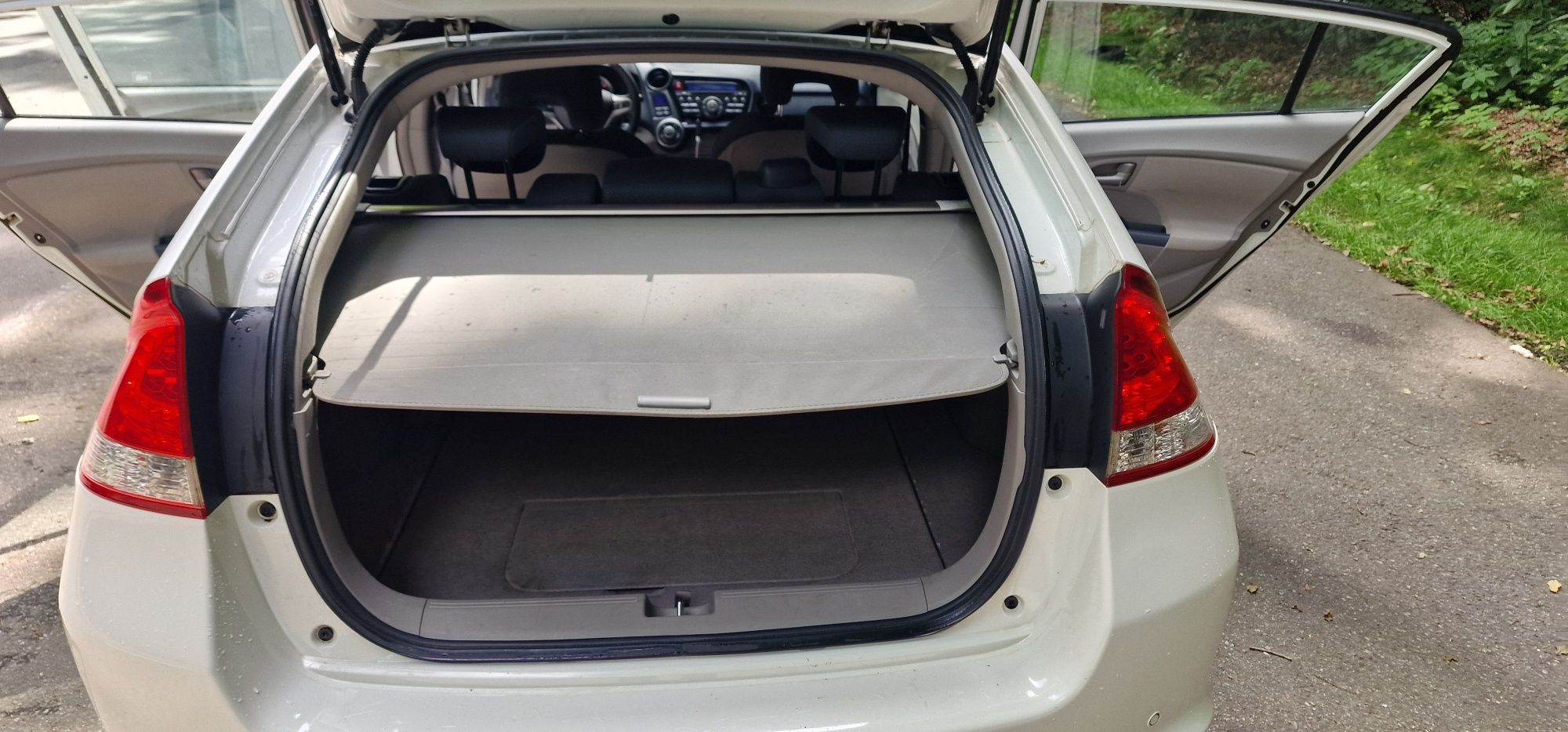 Honda Insight 1.3 Benz + Hybryda
