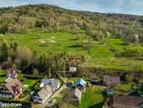 Dom w górach nad strumykiem