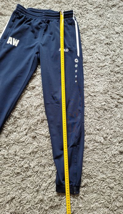 Spodnie JAKO r. 152 - wymiary znajdują się na zdjęciach.
