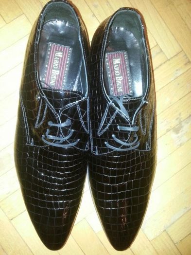 Продам фірменні шкіряні туфлі