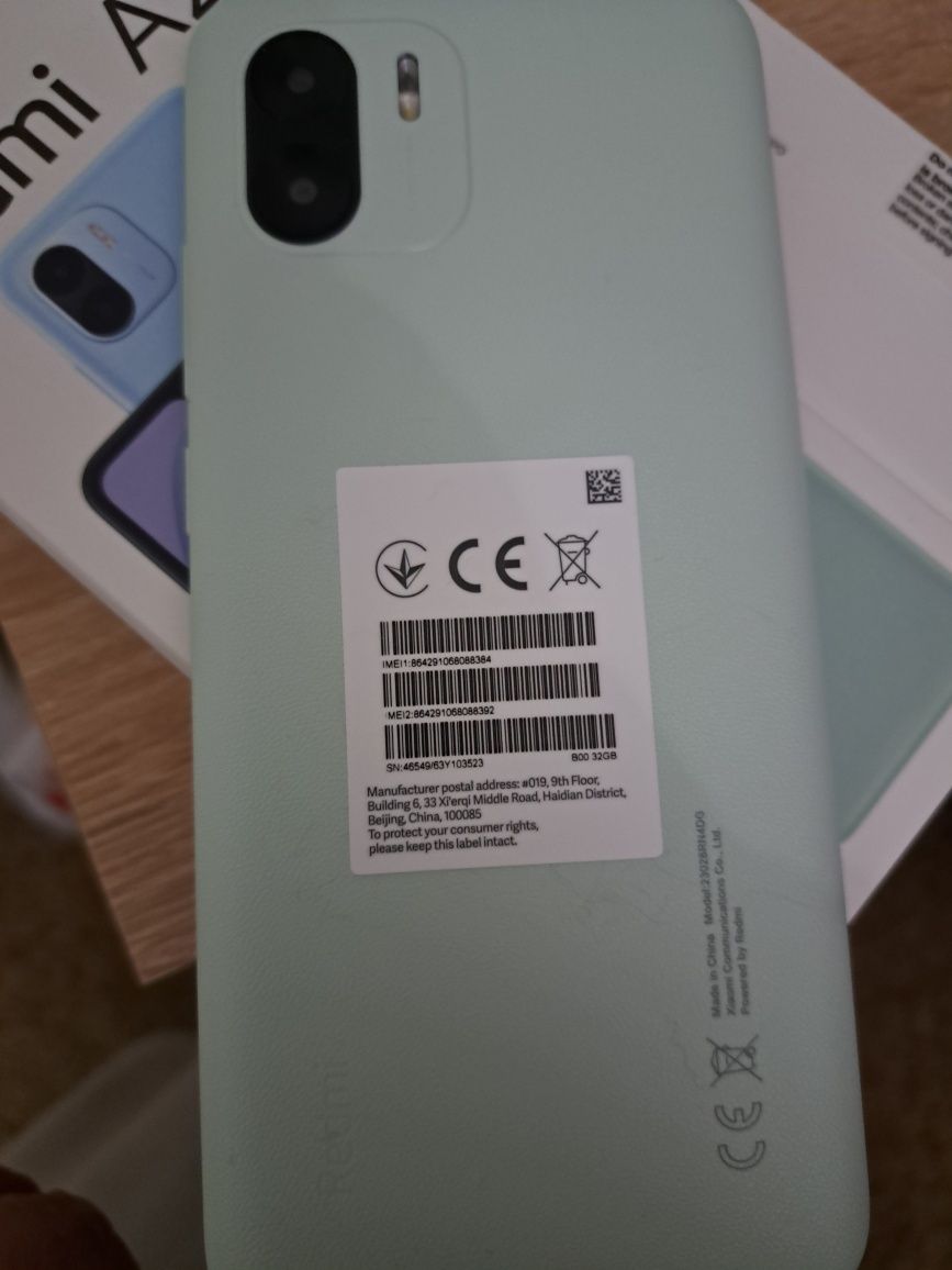 Smartphone xiaomi redmi A2 verde com capa da mesma cor