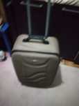 Mala de viagem tom cinza