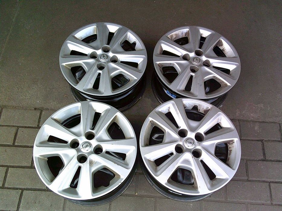 Felgi stalowe Opel 6J15 ET39 4x100 (czujniki+kołpaki)