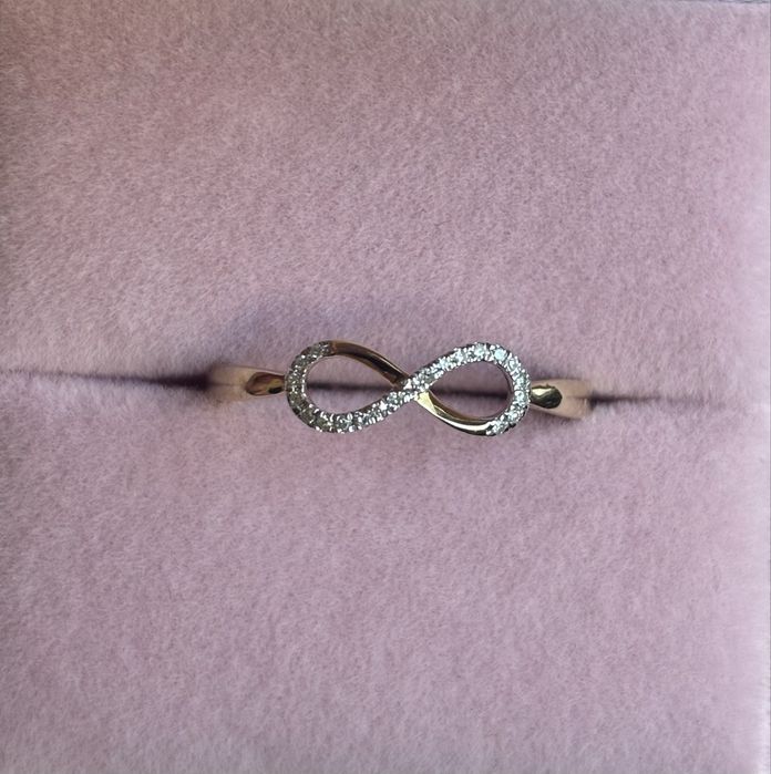 Złoty pierścionek z brylantami 585 r.14