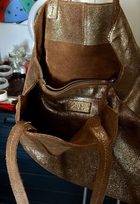 Mala pele dourada Zara