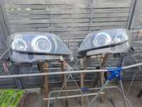 Lampy bi xenon skrętny Opel Astra H