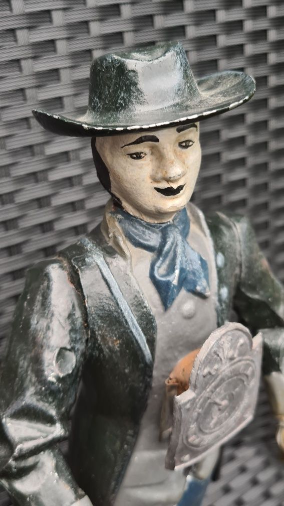 Zegar figuralny, figura sprzedawca zegarów