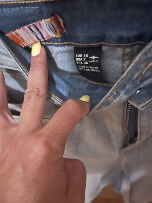 Calças Colcci de ganga elásticas,com recortes dos lados,como novas,36