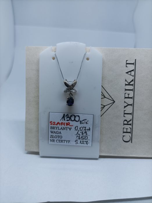 Złoty wisiorek z szafirem i brylantami, złoto białe 750