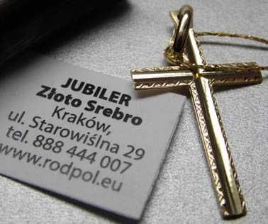 Ozdobny złoty krzyż krzyżyk.