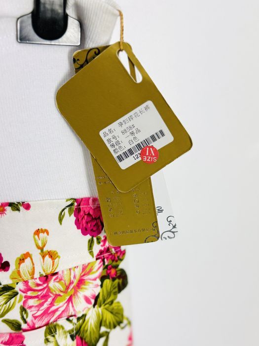 Ciążowe spodnie kwiatowe over-bump XL 42