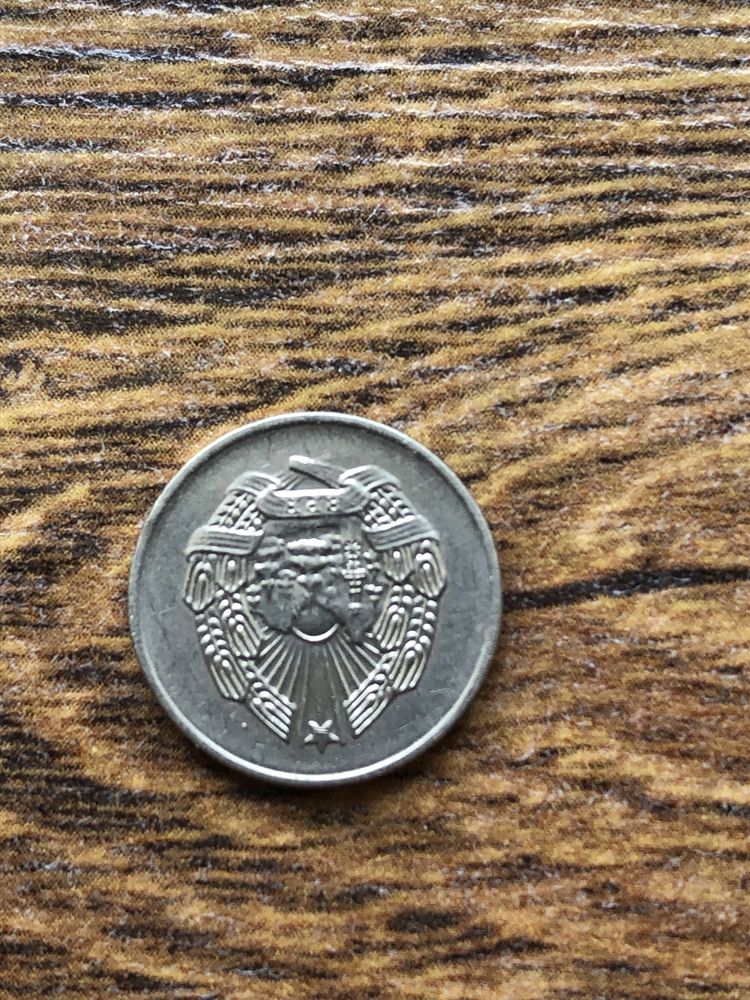 Продаю монету, поворот на 180 градусів