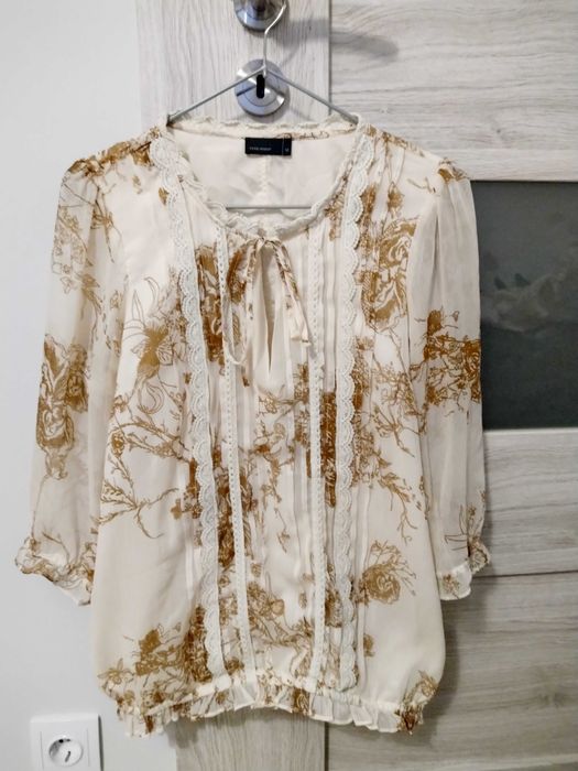 Elegancka bluzka z wiązaniem M