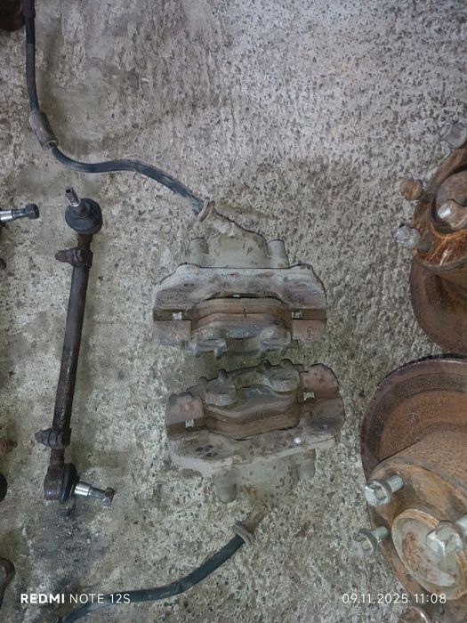 Стойки передні BMW E34 ричаги суппорт диски бмв е34 амортизатори цапфа