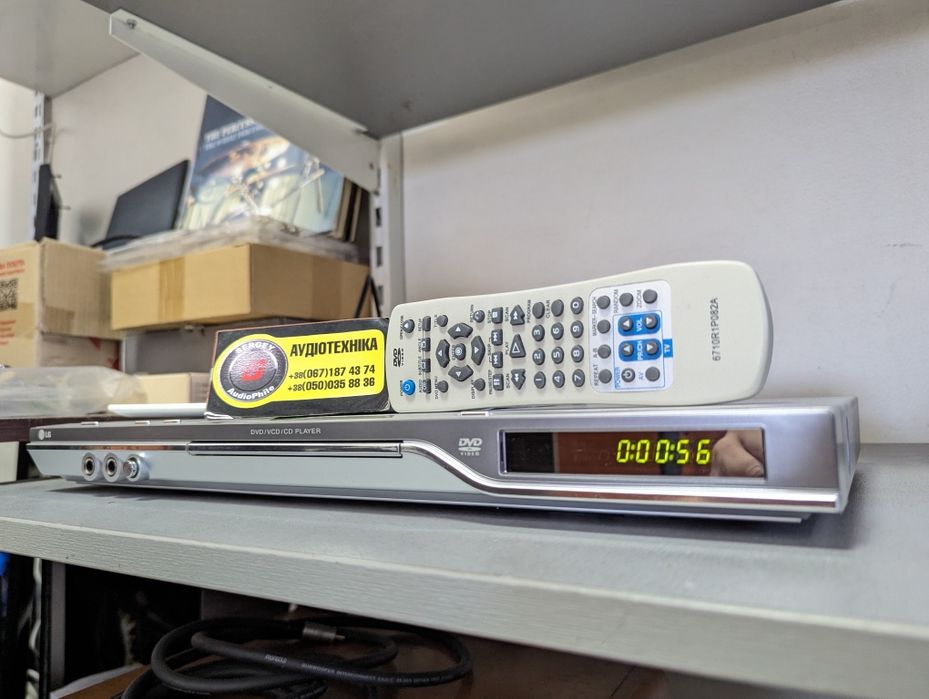 В отличном состоянии DVD Player LG DGK589X. Полный комплект!