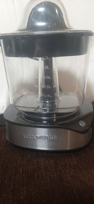 Электрическая соковыжималка для цитрусовых