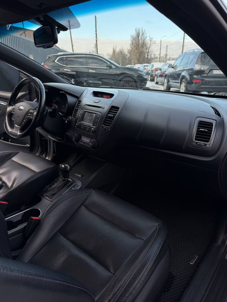 KIA Cerato Koup 1.6 T-GDi ( 204 л.с. ) 2014 год