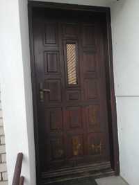 Drzwi zewnętrzne drewniane grube ocieplane wraz z futryną