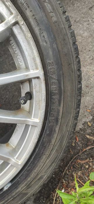 Alu laguna 3 5x114,3 z zimą Falken  215/50/17