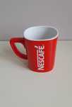 Mały kubek Nescafe