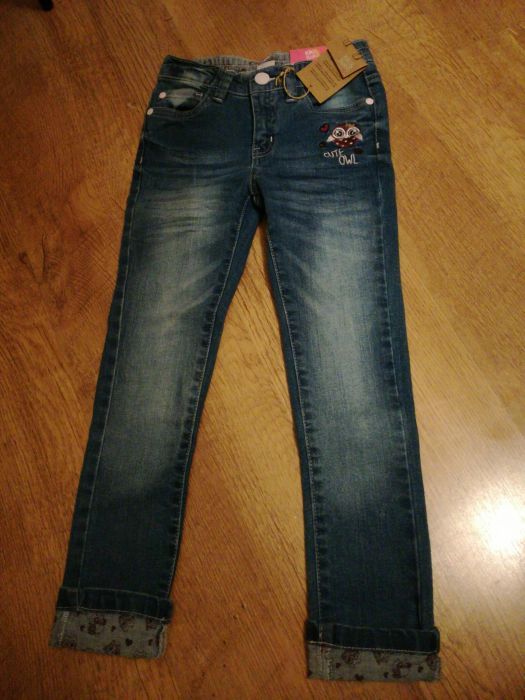Nowe spodnie jeansy dla dziewczynki 122