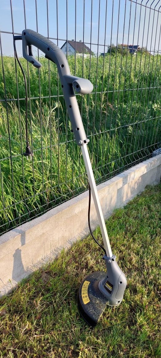 Podkoszarka Meec jak nowa, zabrudzona jedynie trawa