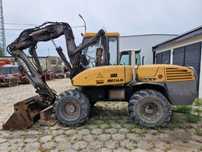 Mecalac 12 MXT  z kompletem łyżek + widły