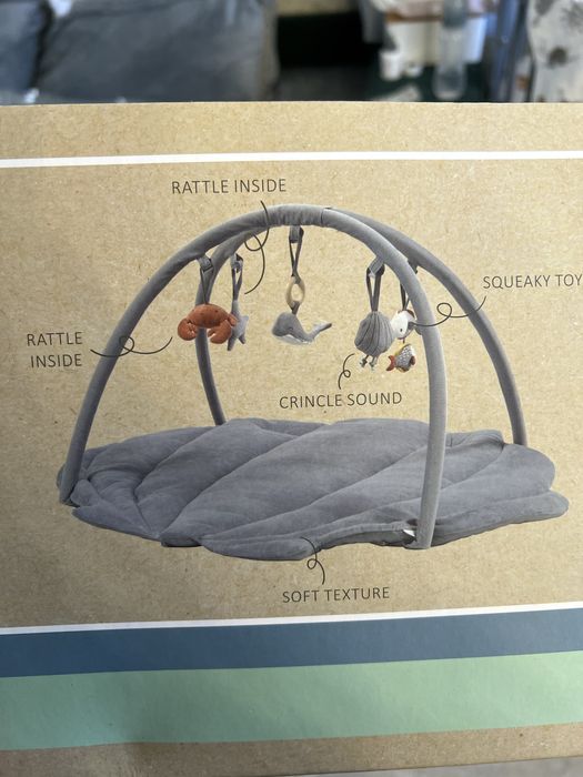 Килим для малюка в формі ракушки