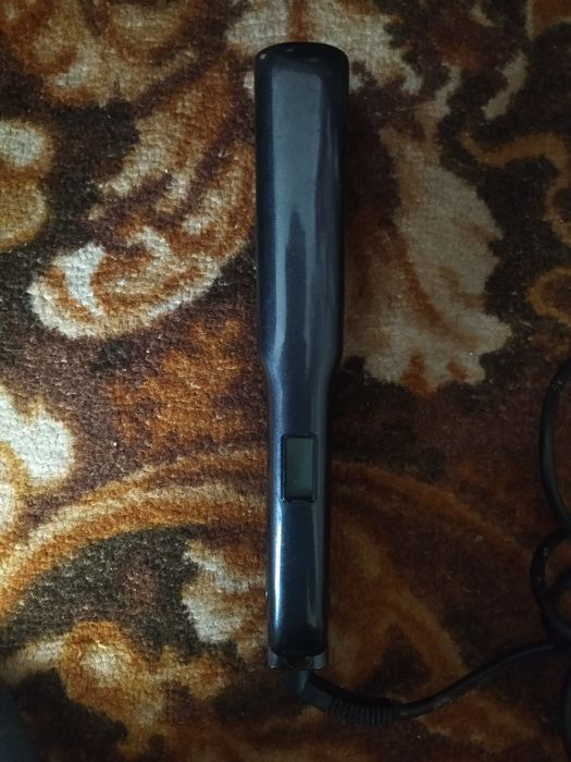 Вирівнювач для волосся