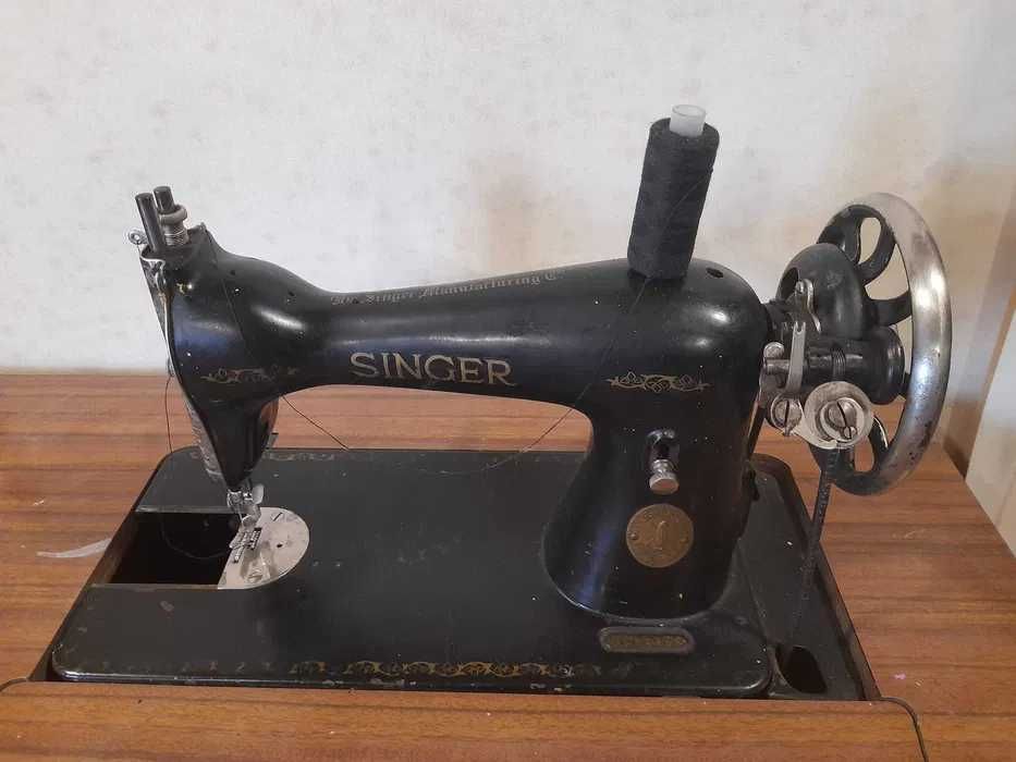 Maquina de costura Singer antiga