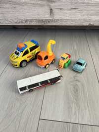 Zestaw zabawkowych autek autka autko autobus koparka