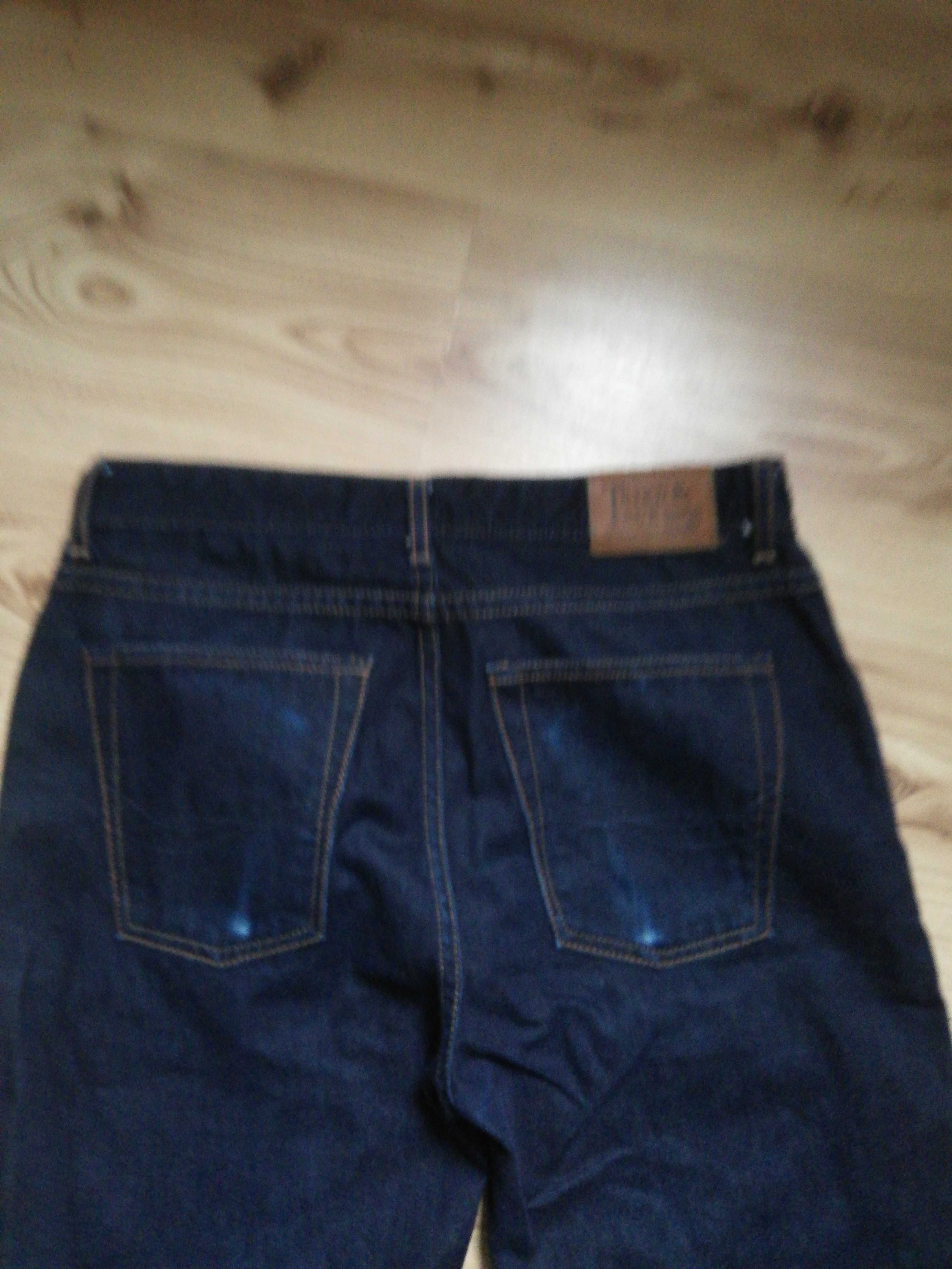 Męskie spodnie jeans 32