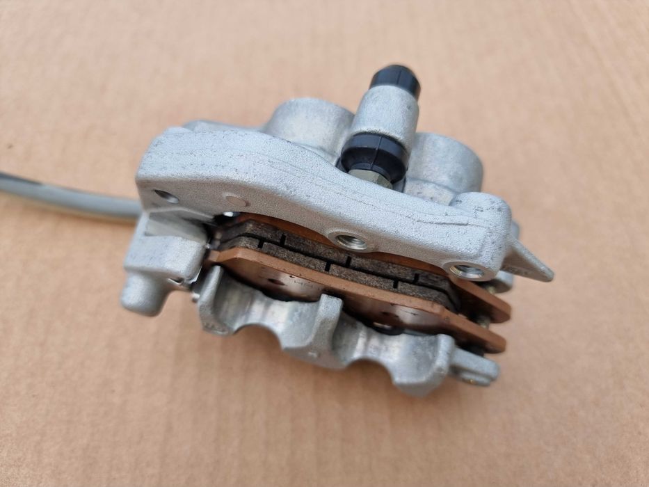 Przód przedni zacisk hamulcowy + przewód Honda CRF 450 stan BDB