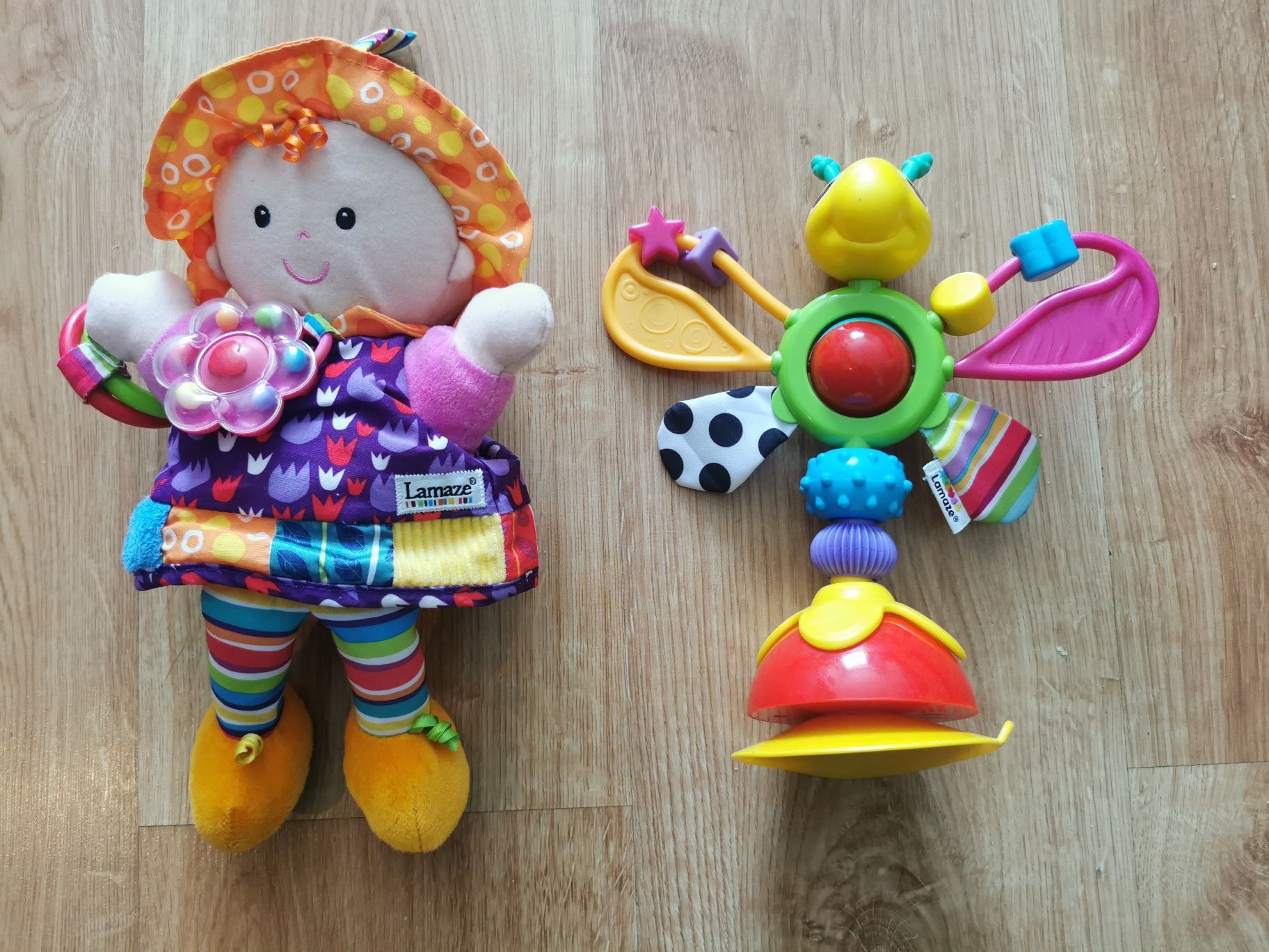 2 zabawki Lamaze (lala i motylek) dla niemowlaka