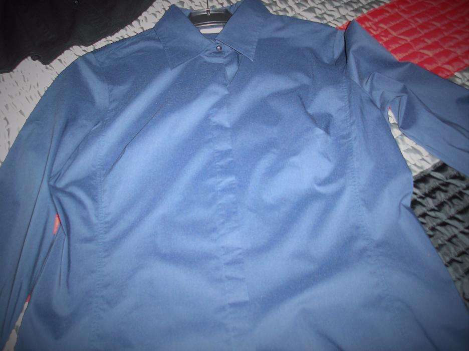 2 Camisas "Novas ",loja C&A.