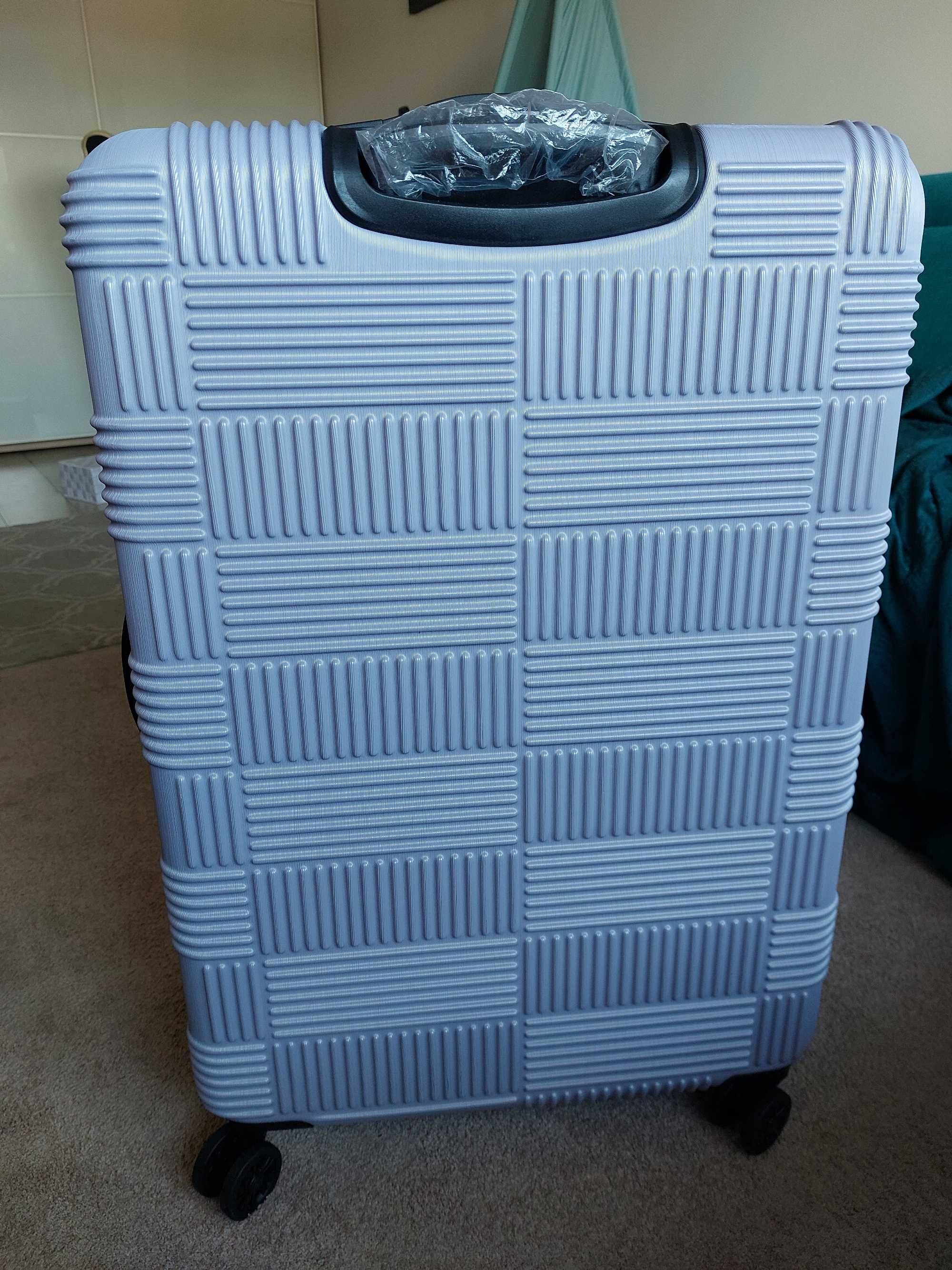 Duża walizka American Tourister NXT liliowa i oryginalna - jak nowa
