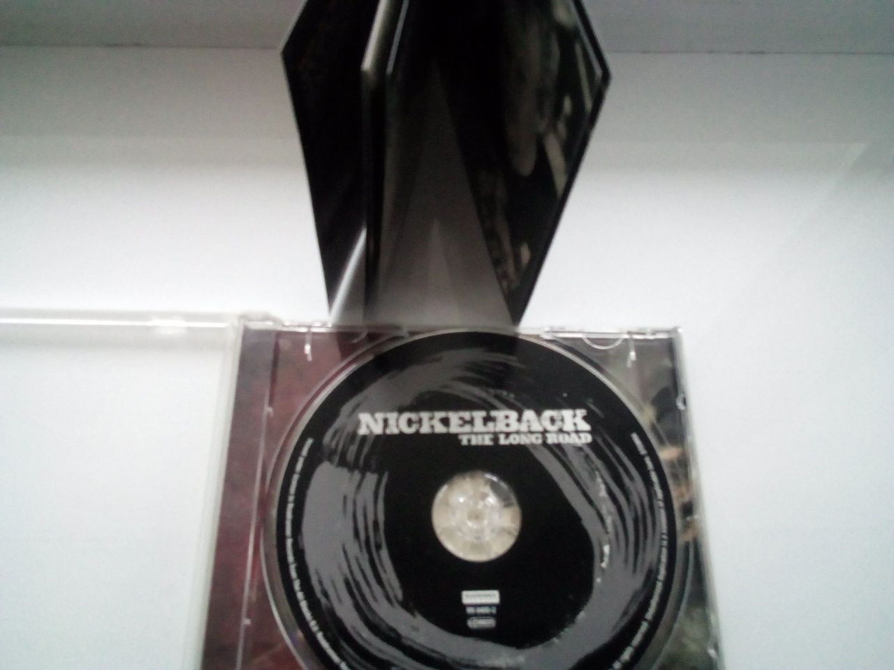 CD диски гр.Nickelback/Sex Pistols