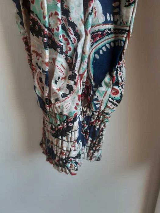 Kombinezon w etniczne wzory na rzemykowych ramiączkach boho